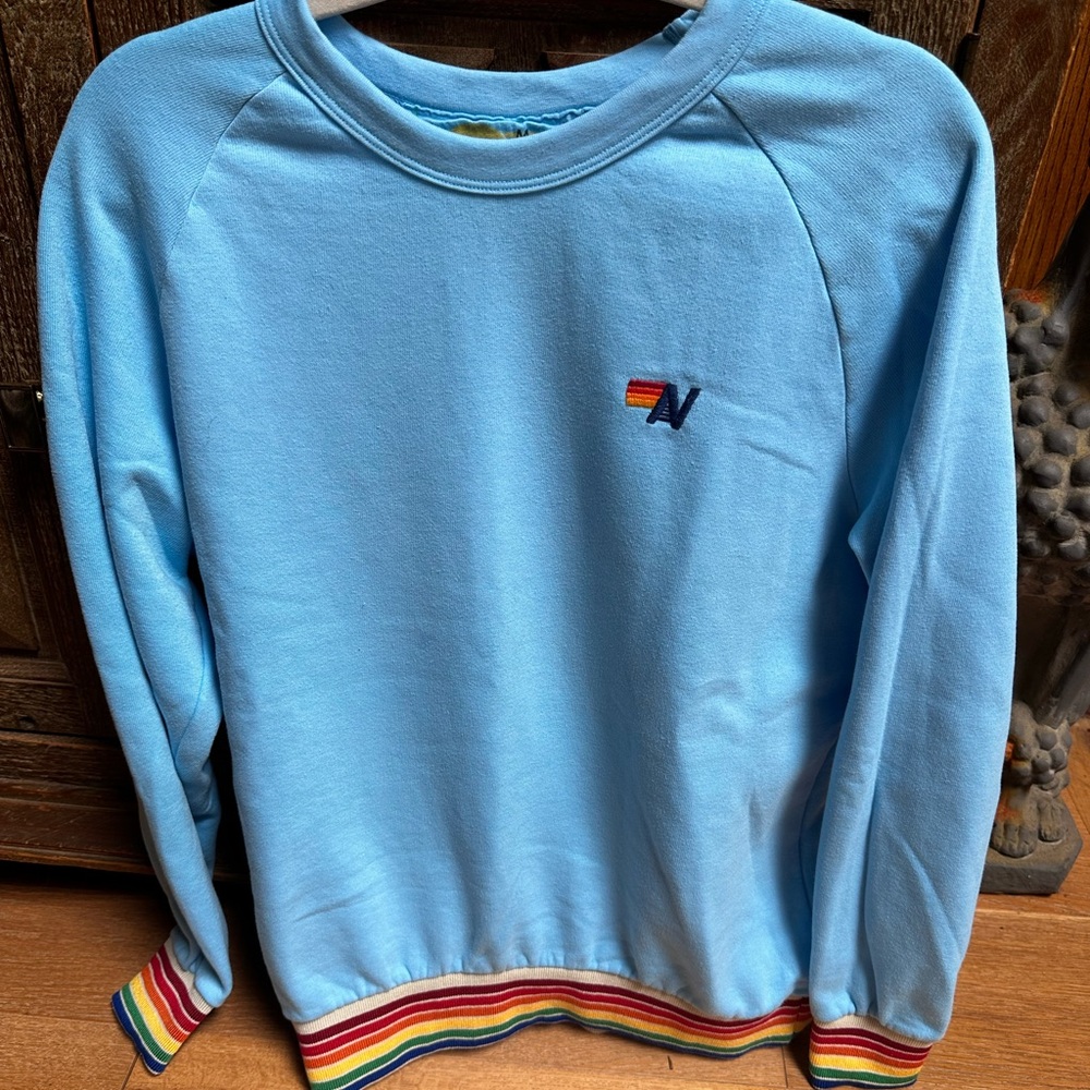 Aviator Nation Light Blue Sweatshirt with Rainbow Accents